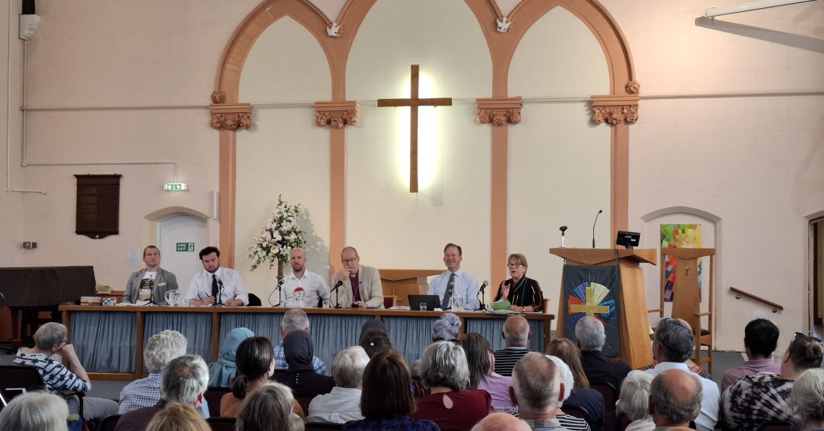 Hustings held in a church, panel and audience