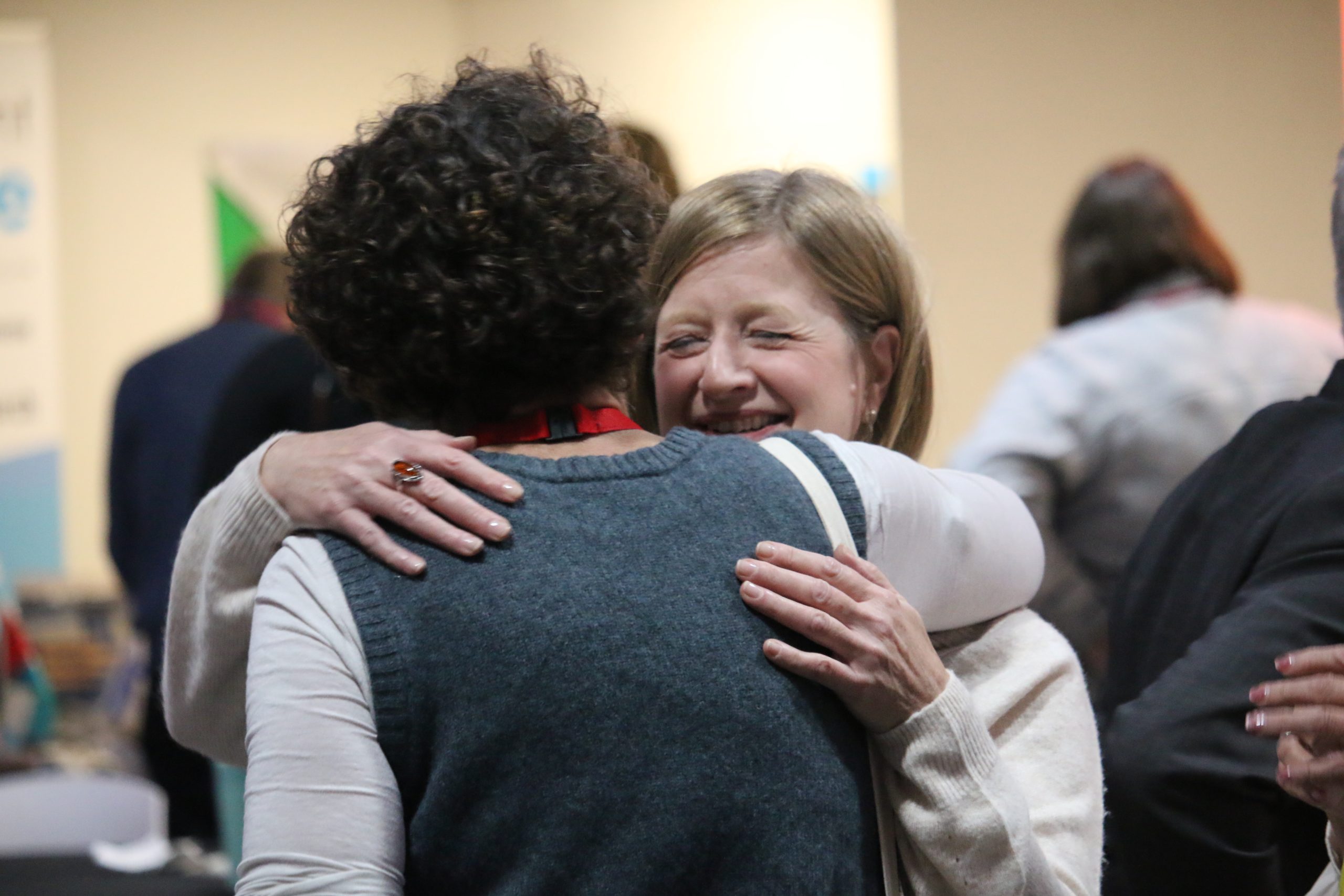 Participants hugging at ForGood25 (Photo by Kevin Snyman)