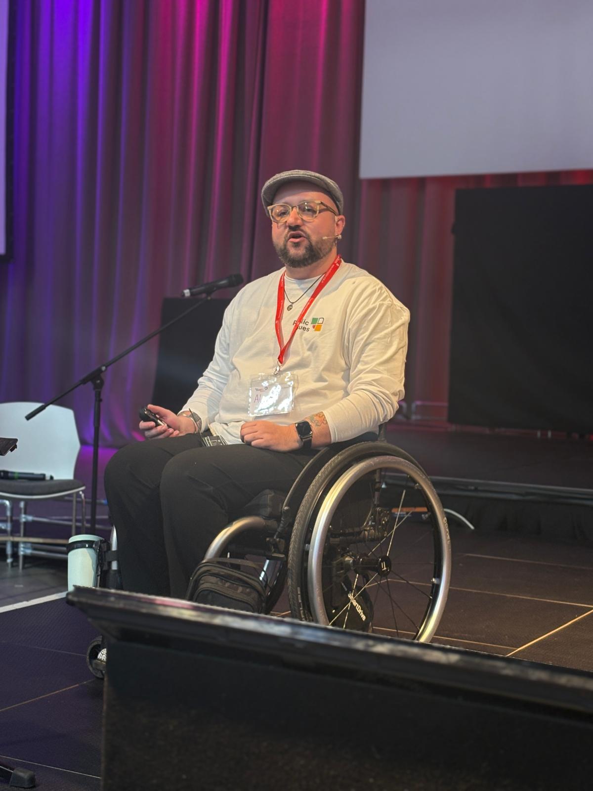 Alex Clare-Young speaking at ForGood25