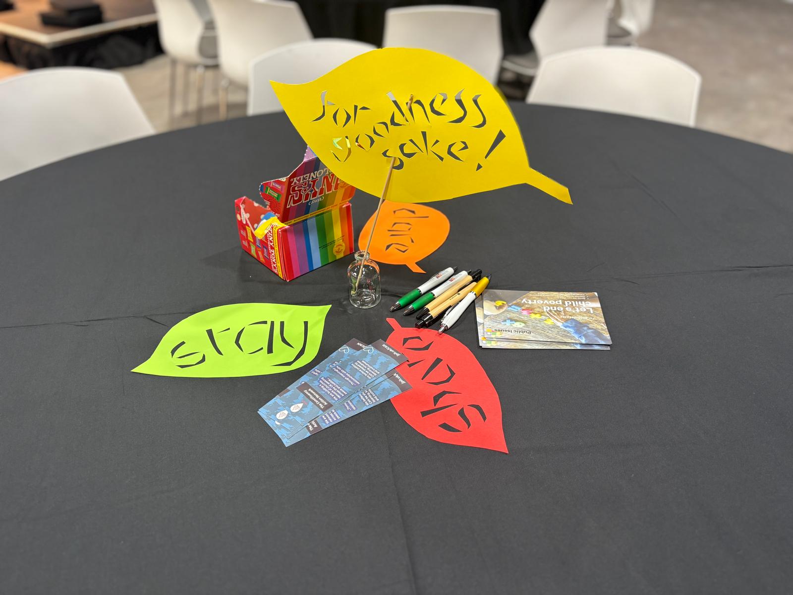 Table centrepiece at ForGood25 (Leaf shape cutouts)